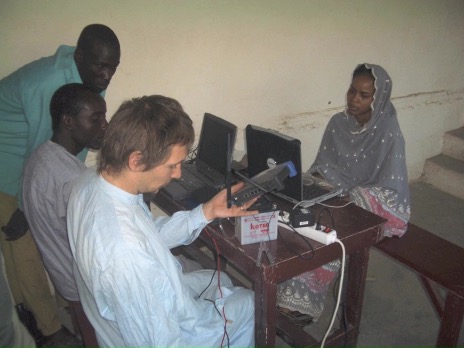 A volunteer teaches a networking class